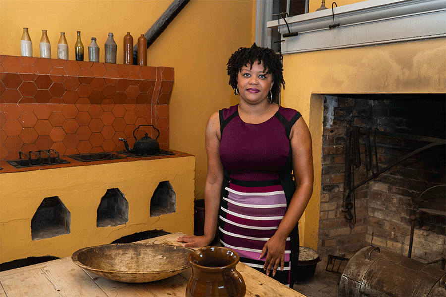 Professor Jacinta Saffold in the Hermann-Grima House courtyard in New Orleans.