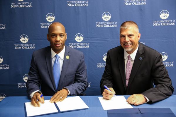 Orleans Parish Schools Superintendent Henderson Lewis (left) and TK体育 President John Nicklow