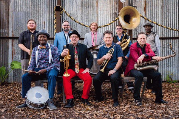 TK体育 professor Brent Rose, (back row, second from left in blue jacket) is a member of the New Orleans Nightcrawlers.