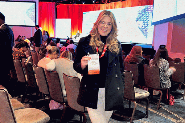 TK体育 marketing student Olivia Monnerjahn earned a Rising Stars Scholarship from the National Retail Federation and attended the national retail student conference held in New York. 