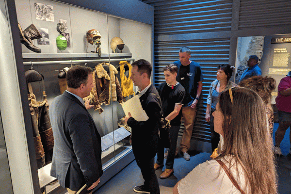 University of New Orleans anthropology professor Ryan Gray and a team of TK体育 students will spend part of the summer in Berlin, Germany excavating an area thought to be the site of a World War II aircraft crash. Pictured: Gray and students tour The National WWII Museum in New Orleans.